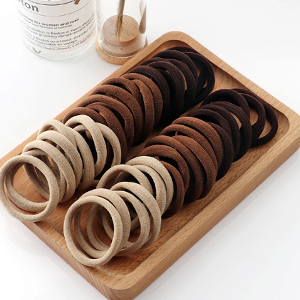 50/100pcs Black & White Hair Bands – High-Elastic Rubber Bands for Women’s Styling & Everyday Use